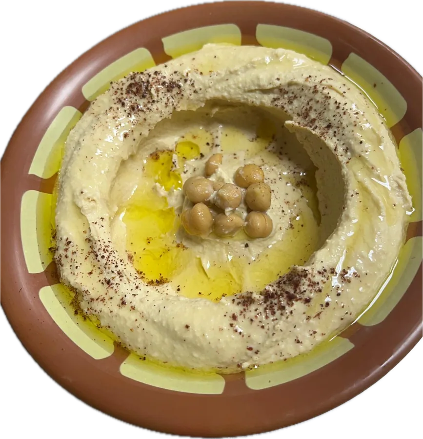 Hummus with olive oil, sumac and chickpeas